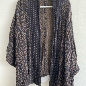 Hand woven brown and black cover wrap shrug